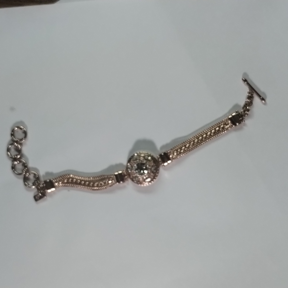 Gingersnap Bracelet Rose Gold in color.  Up to 8 1/2" in length. Toggle closure